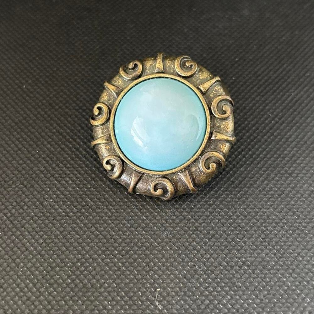 Blue stone ring with ornate